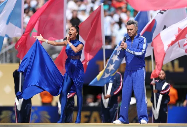 Robbie Williams performed the official Fifa anthem, Desire alongside Pussycat Doll Nicole Scherzinger and Italian singer-songwriter Laura Pausini